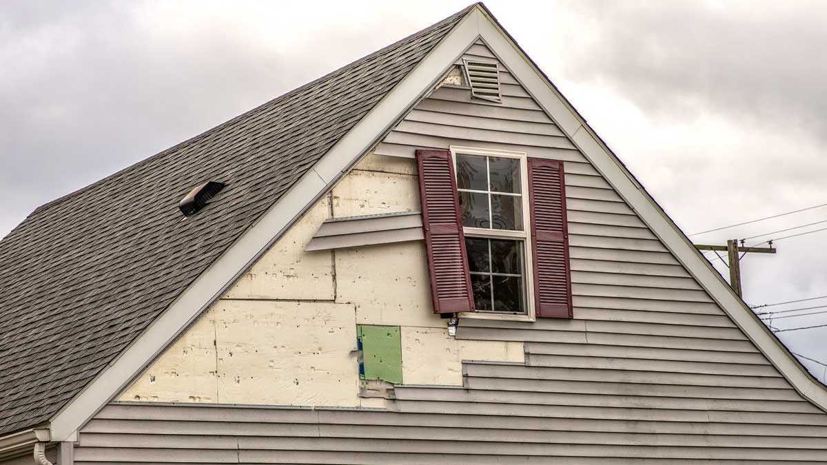 Damage to siding is often overlooked after a storm.